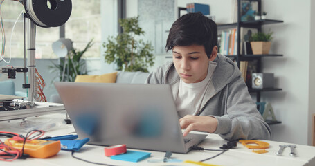 Creative boy learning science and technology at home