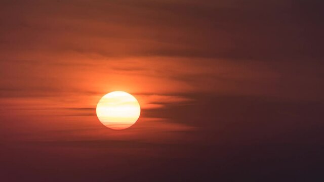 Sun Setting in Sky Telephoto Time Lapse