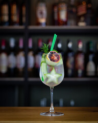 Tasty cocktail based on gin, rum and tonic water 