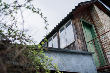 facade of an old wooden house in a village