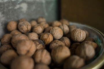a lot of walnuts are in the bucket