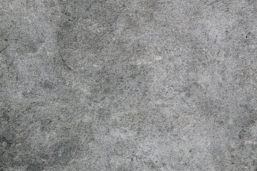 Texture smooth concrete wall with light specks