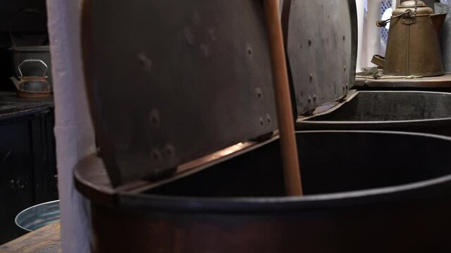 big mixing drums inside of an old warship