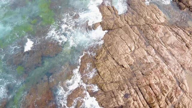 Aerial footage for sea water and rocks