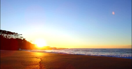 sun rising over emily miller beach