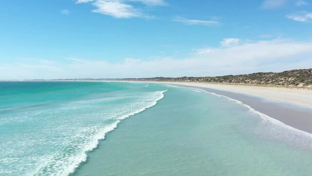 2020 - Excellent aerial shot of waves lapping Surfers Beach on Streay Bay, Eyre Peninsula, South Australia.