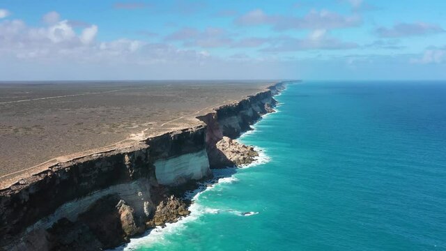 2020 - Excellent aerial shot of clear blue waves cresting on the Great Australian Bight in South Australia.