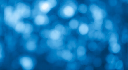 Obraz premium Blue and white bokeh abstract background