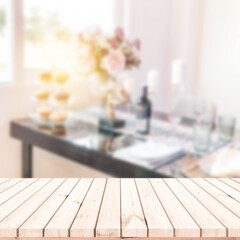 Empty wood table with blur background of dining table for products display