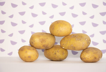 potatoes on a color background