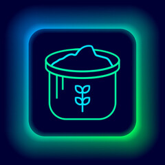 Glowing neon line Bag of flour icon isolated on black background. Colorful outline concept. Vector