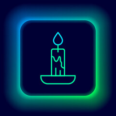 Glowing neon line Burning candle icon isolated on black background. Cylindrical candle stick with burning flame. Colorful outline concept. Vector