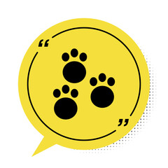 Black Paw print icon isolated on white background. Dog or cat paw print. Animal track. Yellow speech bubble symbol. Vector