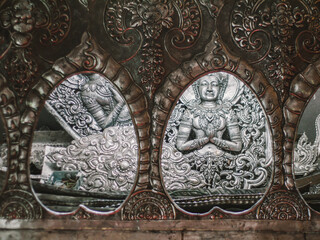 Thai style wall sculpture with space on background 
