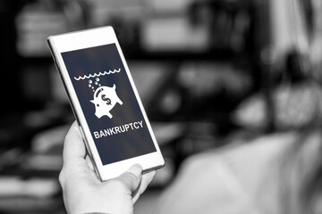Bankruptcy concept on a smartphone