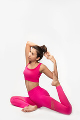 Fototapeta na wymiar Sporty young woman doing yoga exercise in studio ,concept of healthy life and natural balance between body and mental development