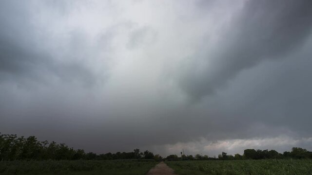Time Lapse Stormy Clouds Flowing Above Agricultural Field Thailand. Arcus Cloud Background