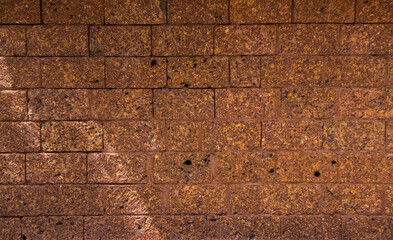 laterite background of old brick wall texture.