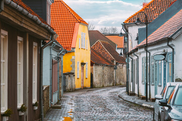 Kuressaare, Estonia. Famous Old Buildings Houses In Kohtu Street. Altered Sky