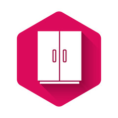 White Wardrobe icon isolated with long shadow. Pink hexagon button. Vector