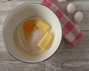 Ingredients for  a dough in a bowl
