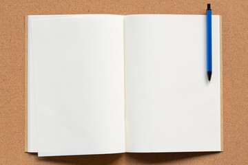 White note paper notebook open pages on table. Backdrop art design copy space for text message.