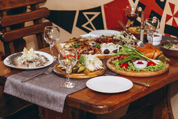 delicious European and Slavic cuisine on the big table waiting for guests. table with food, top view