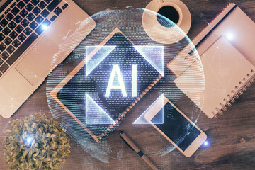 Double exposure of technology theme drawing over work table desktop. Top view. Global data analysis...