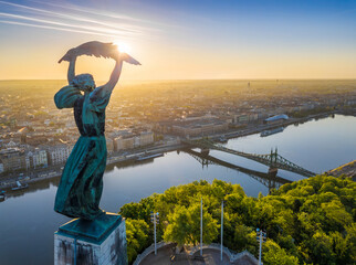 Budapest, Hungary - Aerial view from the top of Gellert Hill with Statue of Liberty, Liberty Bridge...