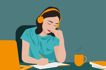 Young beautiful student girl listening to online courses in headphones at home, online studying concept