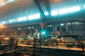 Metallurgical plant or Steel Factory, Large Workshop Interior with industrial equipment and workers, Heavy Industry, Iron and Steelmaking.