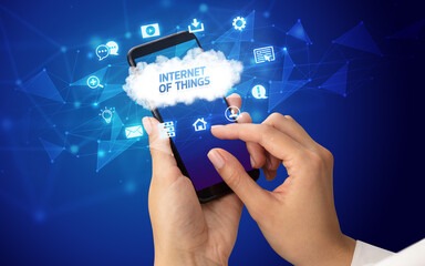 Obraz premium Hand using smartphone with cloud technology concept