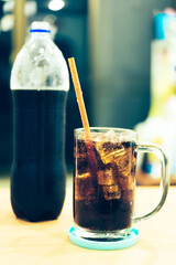 Refreshing Bubbly Soda Pop with Ice Cubes. Cold soda iced drink in a glasses - Selective focus, shallow DOF	
