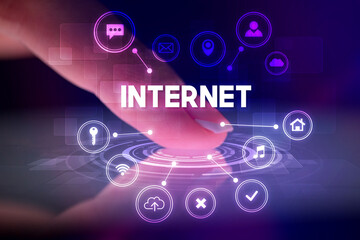 Finger touching tablet with web technology icons concept