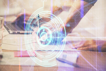 Obraz premium Double exposure of woman hands working on computer and data theme hologram drawing. Tech concept.