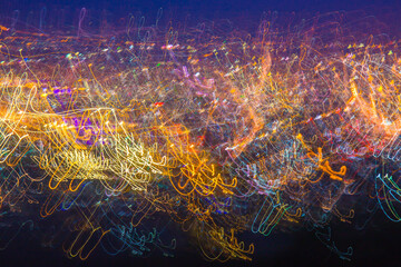 Abstract Blurred bokeh lights in the city. Background illustration with light colours for backdrop design or add text message.