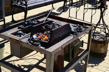 Manual craftsmanship. The blacksmith creates his masterpiece