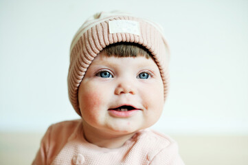 Baby girl in pink clothes