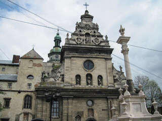 Beautiful religious facade of the Church of St. Andrew and the Bernardine Monastery - a monument of history and architecture in Lviv, located on Cathedral Square .