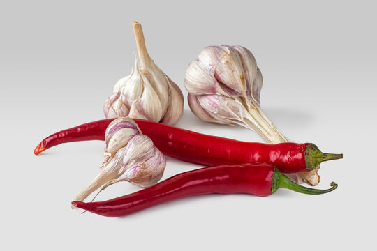 Red pepper pods and a few garlic heads