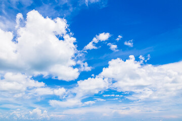 Beautiful white fluffy cloud on blue sky background.