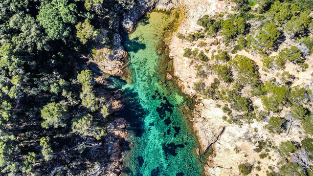 Aerial shot of the beautiful nature in Cala Bona, Tossa de Mar, Spain