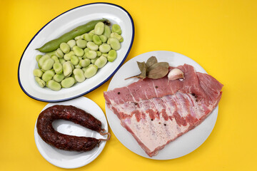 ingredients for portuguese dish green beans, smoked sausage and meat