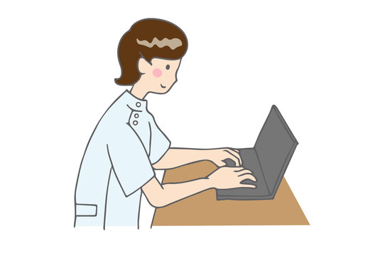 パソコンで作業する医療従事者
