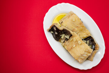 boiled cod fish with olive oil on white dish