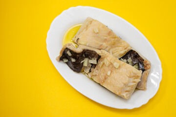 boiled cod fish with olive oil on white dish