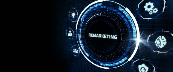 The concept of business, technology, the Internet and the network. A young entrepreneur working on a virtual screen of the future and sees the inscription: Remarketing