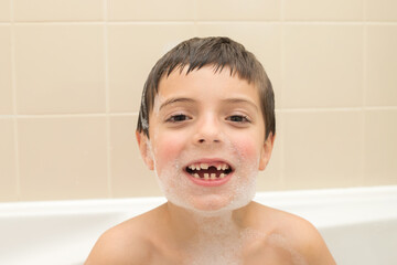 boy having fun in the bath