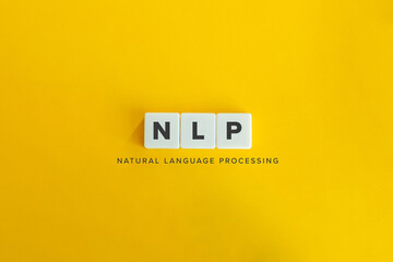 NLP (Natural Language Processing) banner and concept. Block letters on bright orange background....