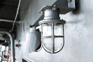 Steel Lantern Industrial Style Installed on Wall in a Ship.